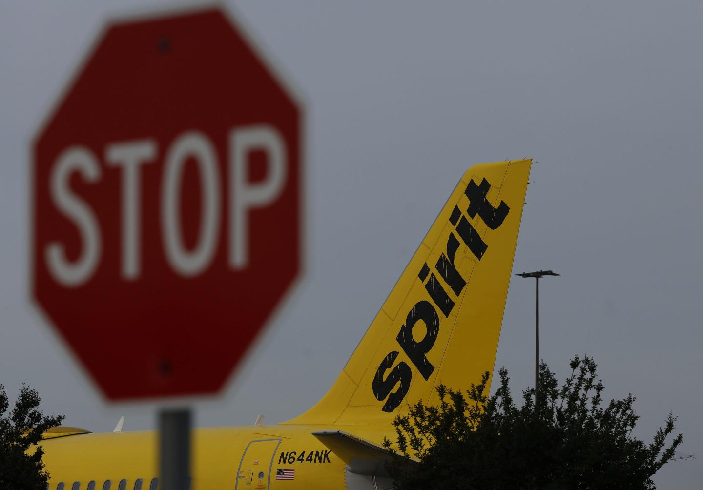 A Spirit Airlines plane sits parked at Hollywood Burbank Airport on April 16, 2026 in Burbank, Calif. 