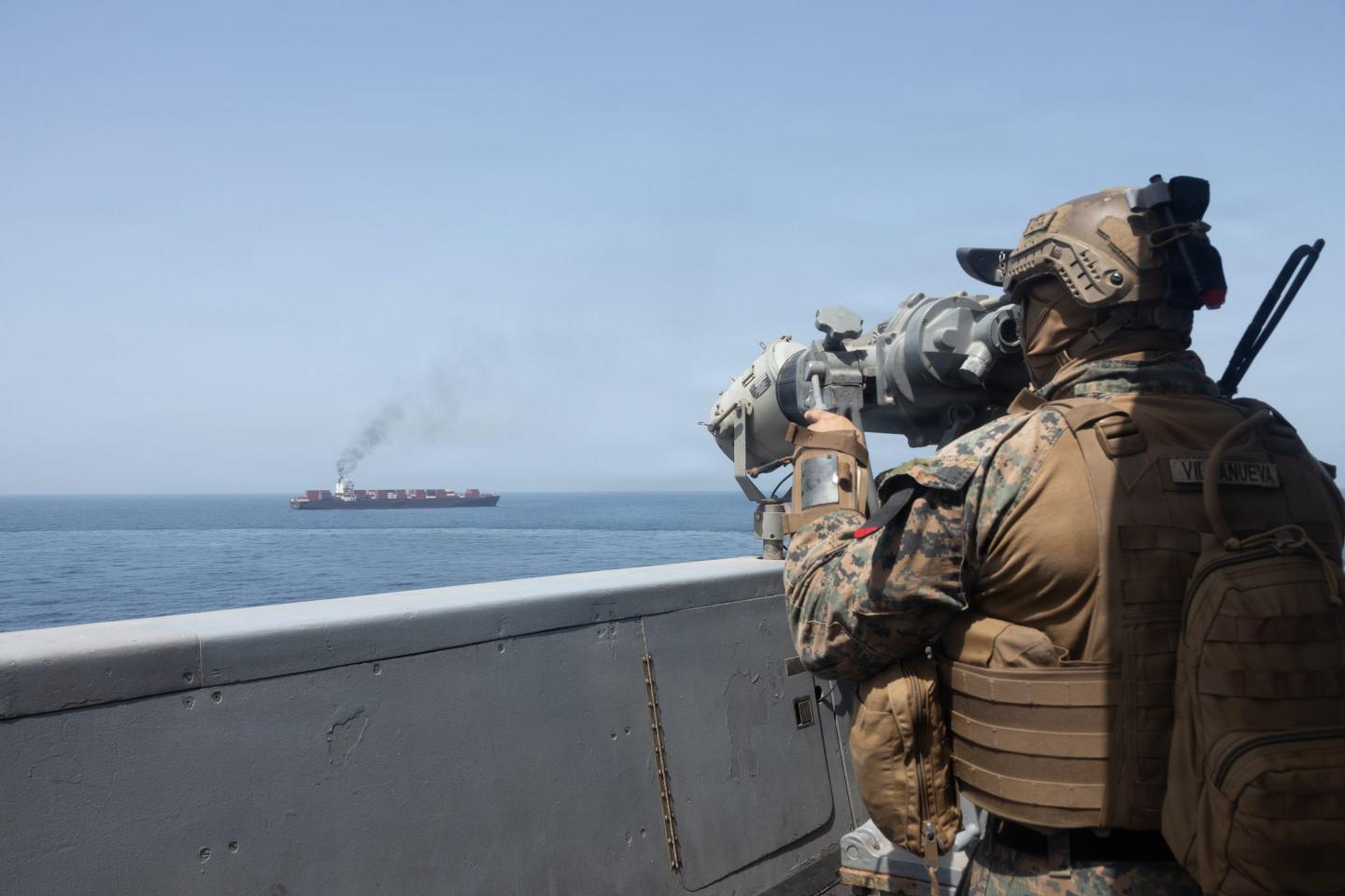 In this handout photo provided by U.S. Central Command, U.S. forces patrol the Arabian Sea near M/V Touska on April 20, 2026, after firing upon the Iranian-flagged vessel that the U.S. accused of attempting to violate the U.S. naval blockade of Iranian ports near the Strait of Hormuz. (Handout Photo by the U.S. Navy via Getty Images)