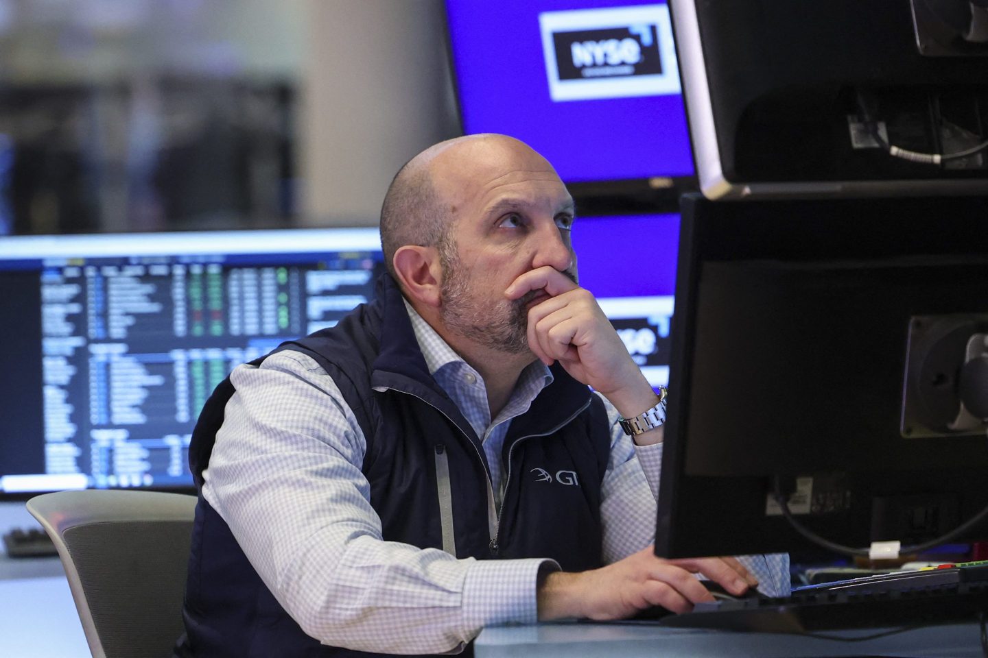 A trader works at the New York Stock Exchange in New York on April 22, 2026.