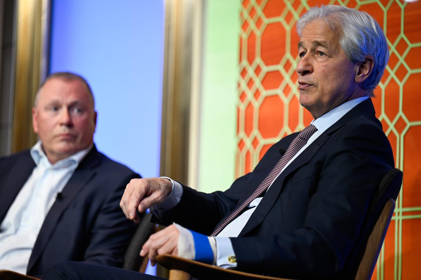 Nicolai Tangen, chief executive officer of Norges Bank Investment Management, left, and Jamie Dimon, chief executive officer of JPMorgan Chase & Co., at the Norges Bank Investment Management annual investment conference in Oslo, Norway, on Tuesday, April 28, 2026.