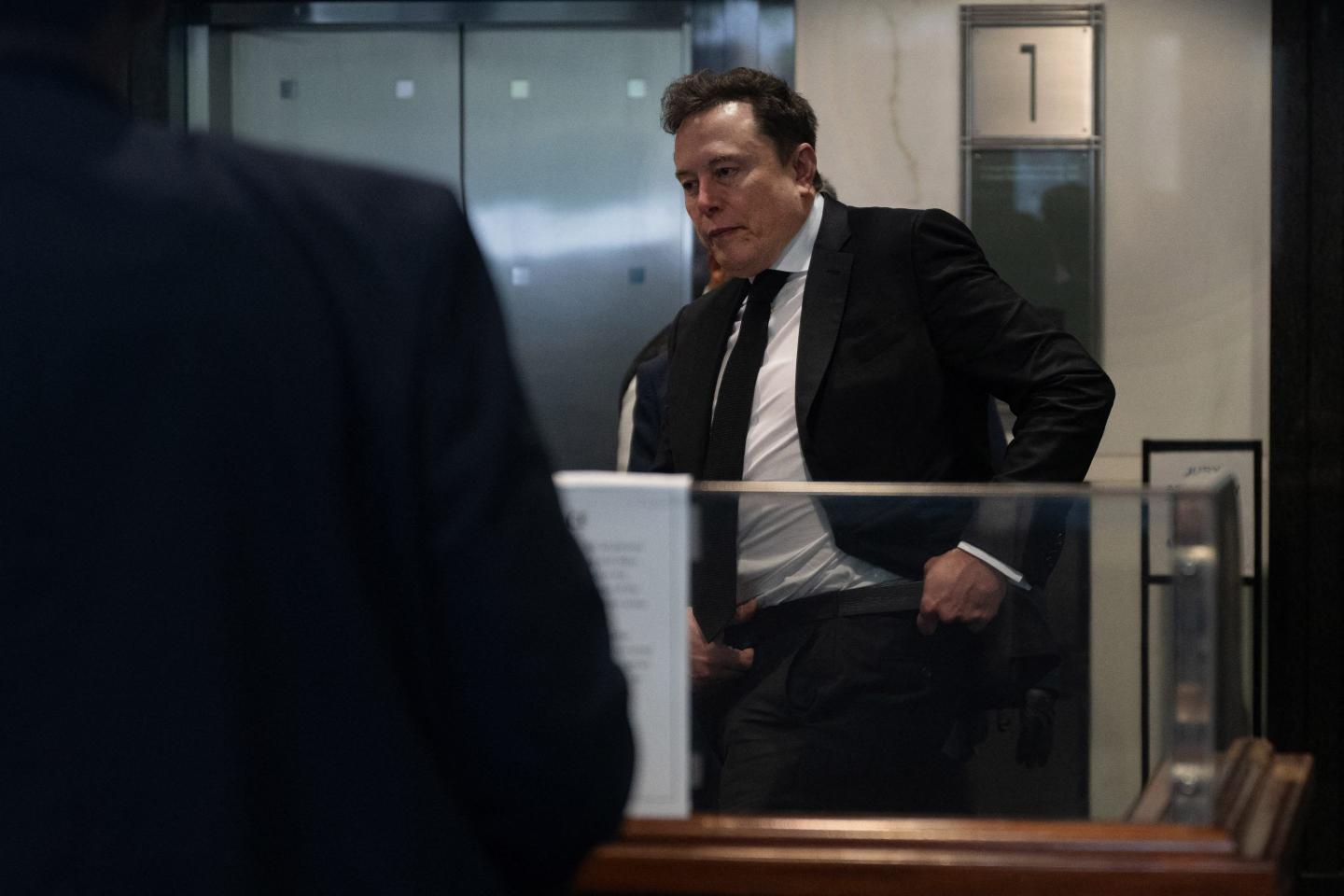 Elon Musk arrives at the federal courthouse as opening statements begin in the trial over Elon Musk's lawsuit against OpenAI in Oakland, California, on April 28, 2026.
