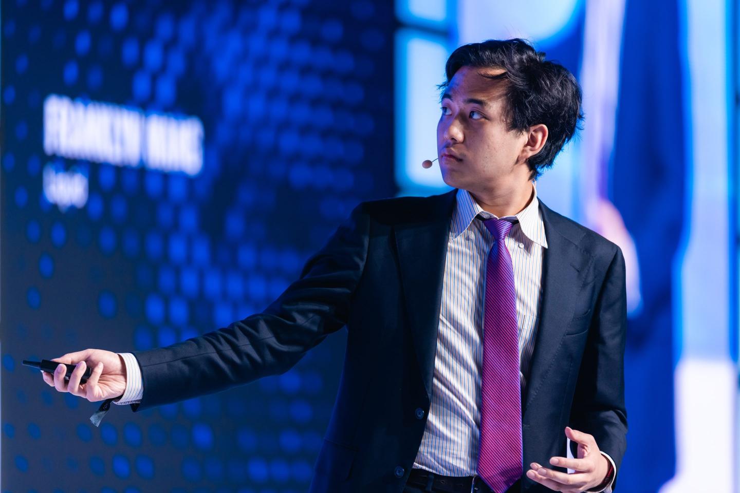 Liquid CEO Franklyn Wang speaks at a crypto conference