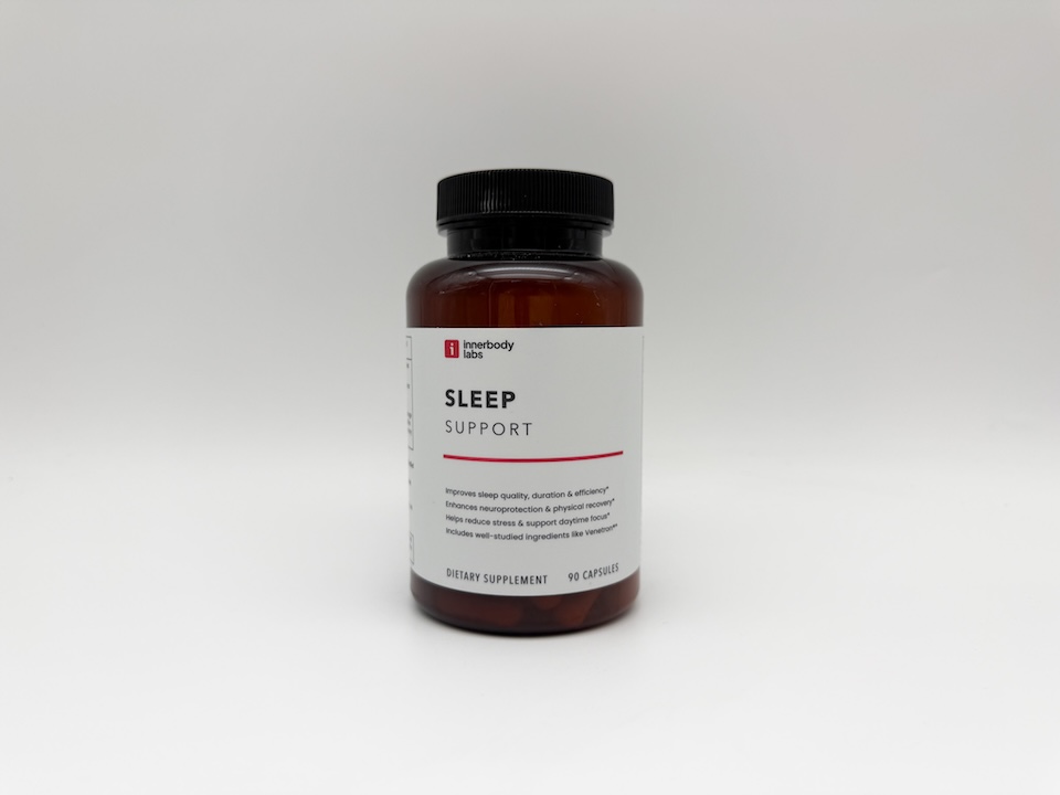 A bottle of Innerbody Labs Sleep Support sitting on a white countertop.