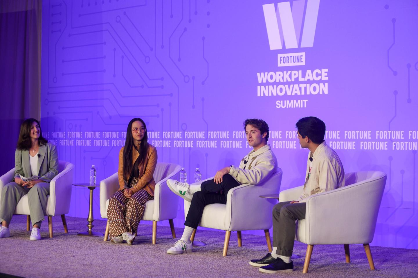 A panel on Gen Z workers sit alongside Fortune's Kristin Stoller at the Fortune Workplace Innovation Summit.