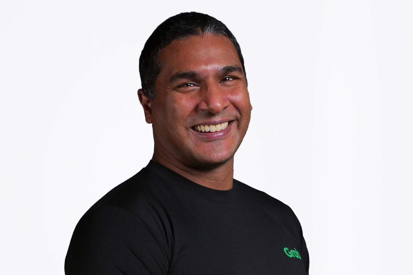 How Grab’s CTO sees the superapp’s push into physical AI and automated driving—and why he uses his competitors’ robots in the office