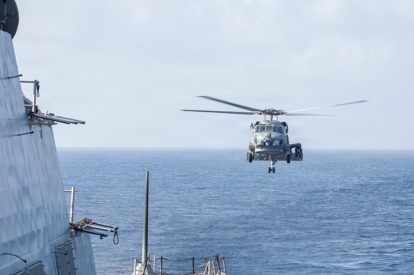 An MH-60R Sea Hawk, attached to Helicopter Maritime Strike Squadron (HSM) 46, conducts a flight quarters evolution aboard Arleigh Burke-class guided-missile destroyer USS Delbert D. Black (DDG 119), May 23, 2026, in the U.S. 5th Fleet area of operations.