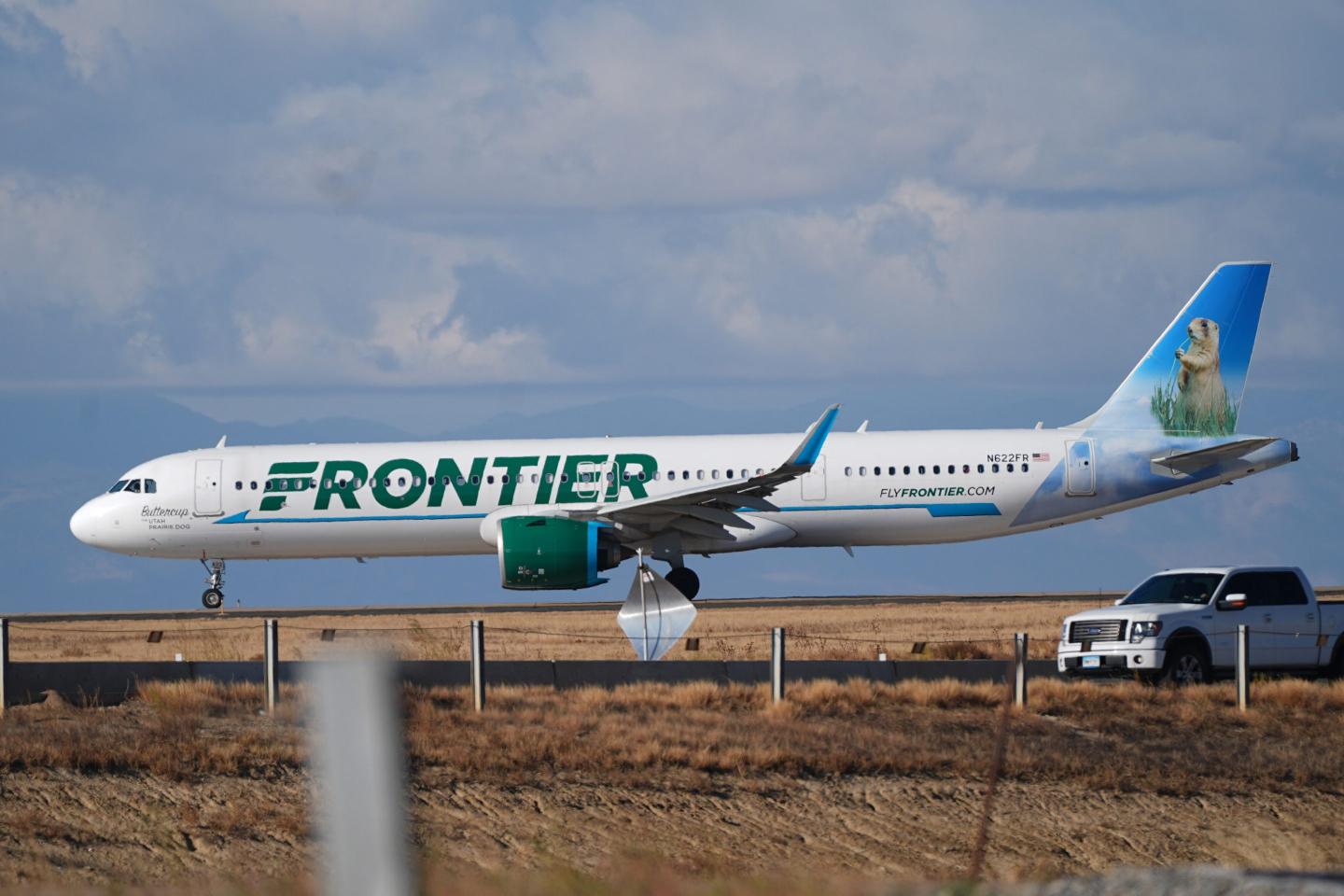 Pedestrian who jumped Denver airport fence dies after being hit by Frontier Airlines plane, sparking an engine fire and forcing passengers to evacuate