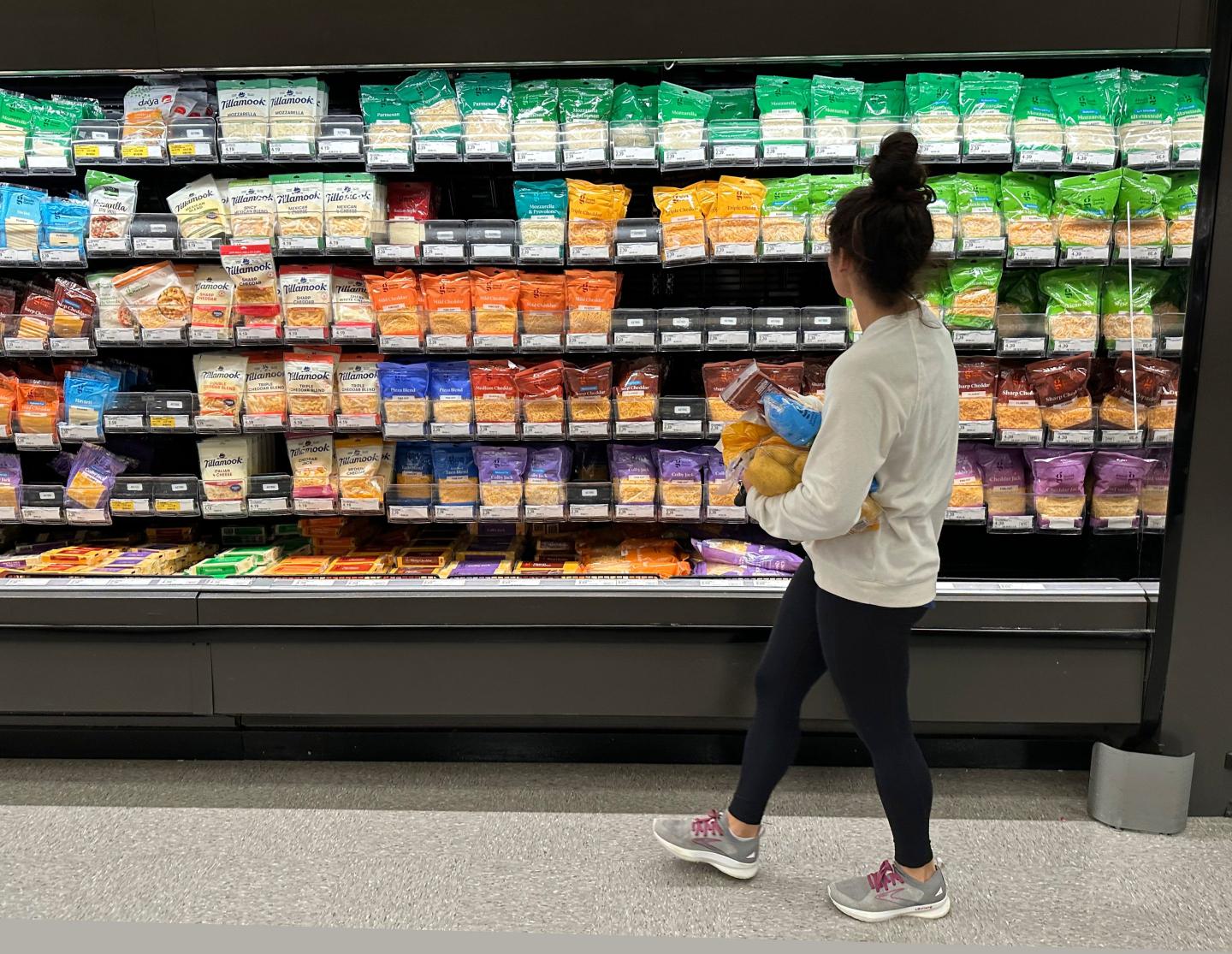 A shopper peruses cheese offerings at a Target store Wednesday, Oct. 4, 2023, in Sheridan, Colo.