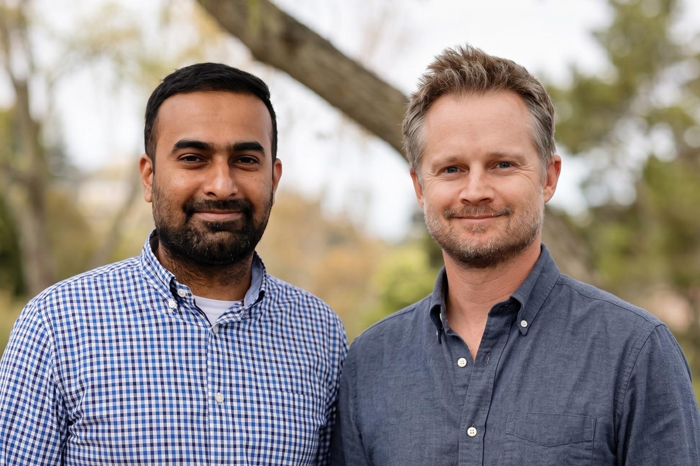 Ali Hussain (left) and Mike MacLennan (right) smile