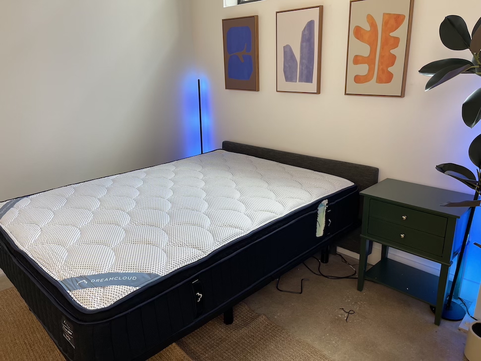 The DreamCloud Premier Memory Foam mattress on an adjustable base