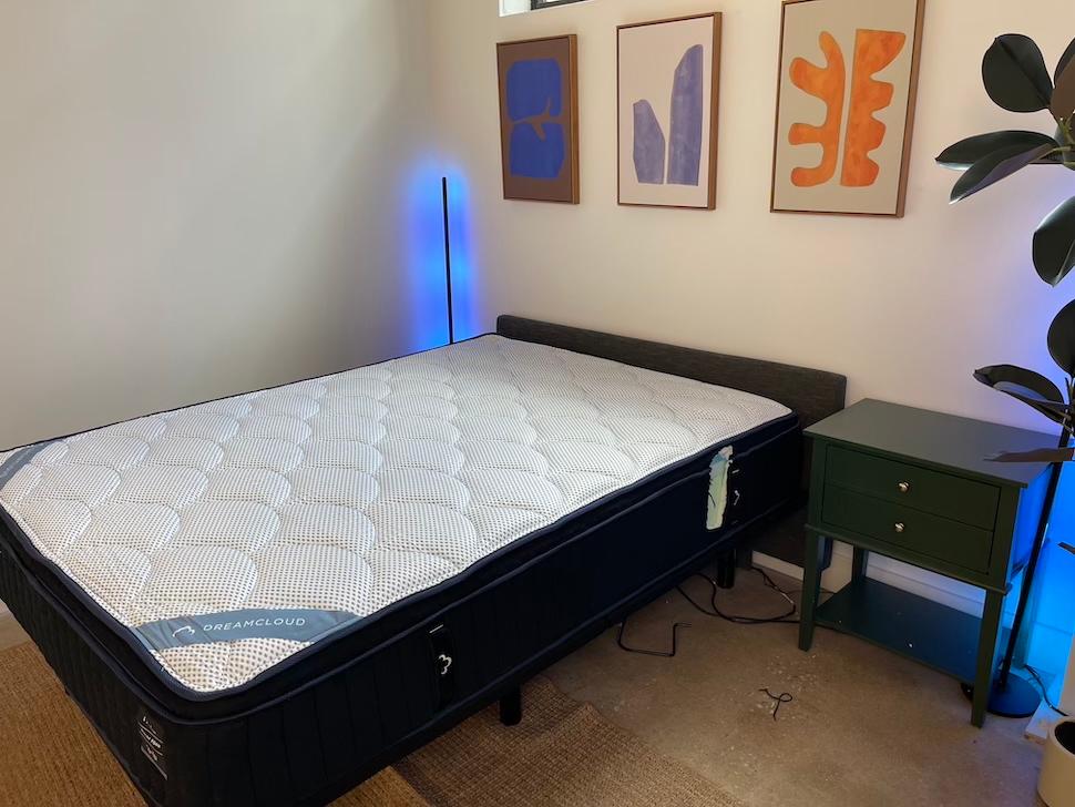 The DreamCloud Premier Memory Foam mattress on an adjustable base