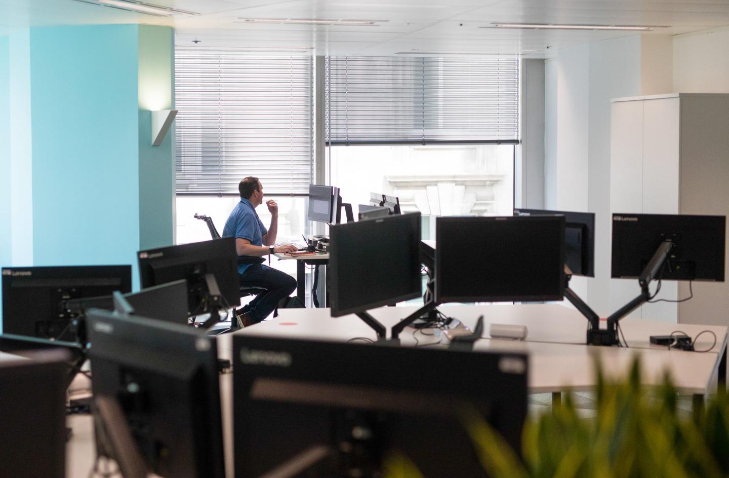 worker alone in empty office