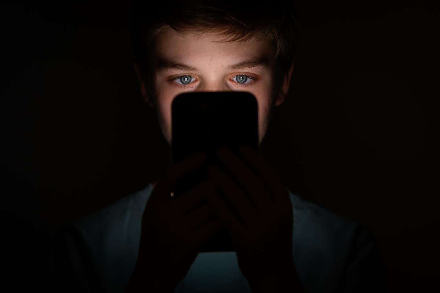 kid on phone