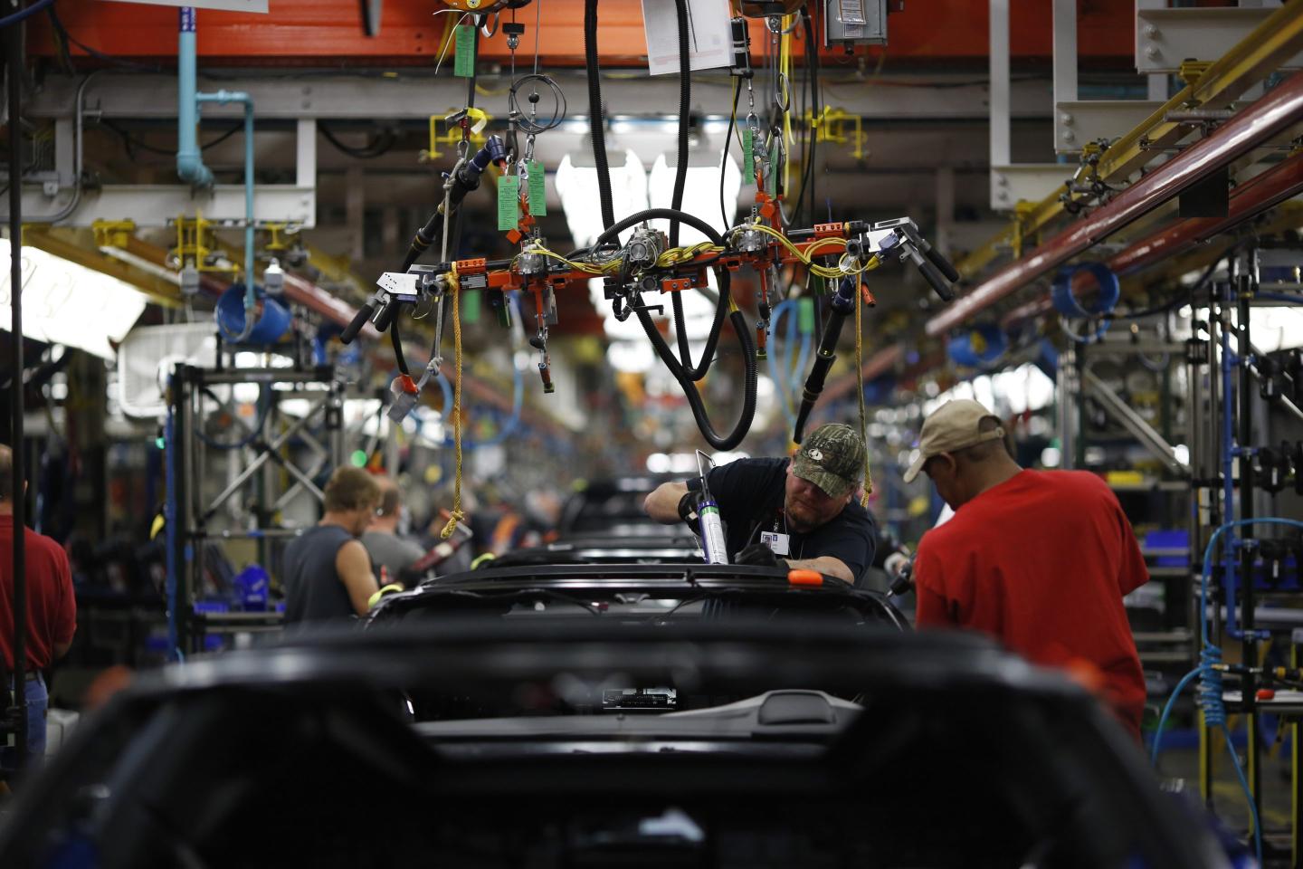 Employees in a General Motors factory.