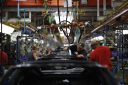 Employees in a General Motors factory.