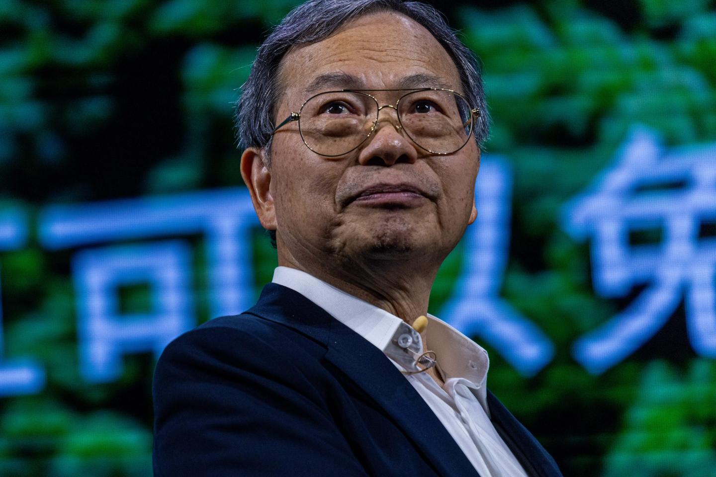 Man in a suit with glasses