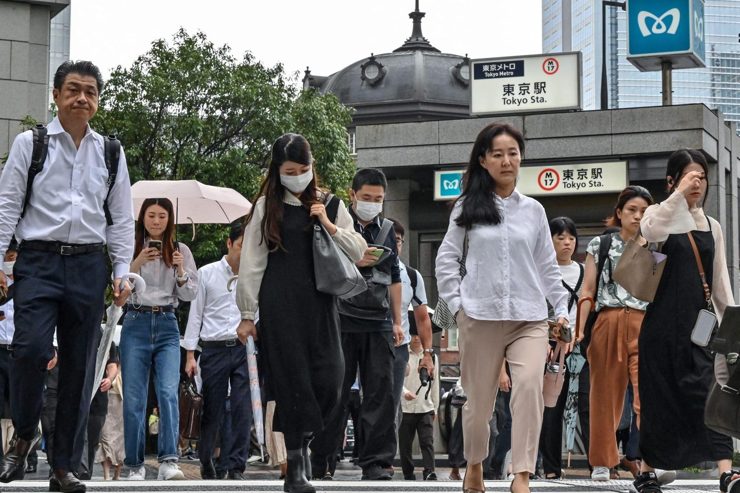 Japanese workers commuting to the office