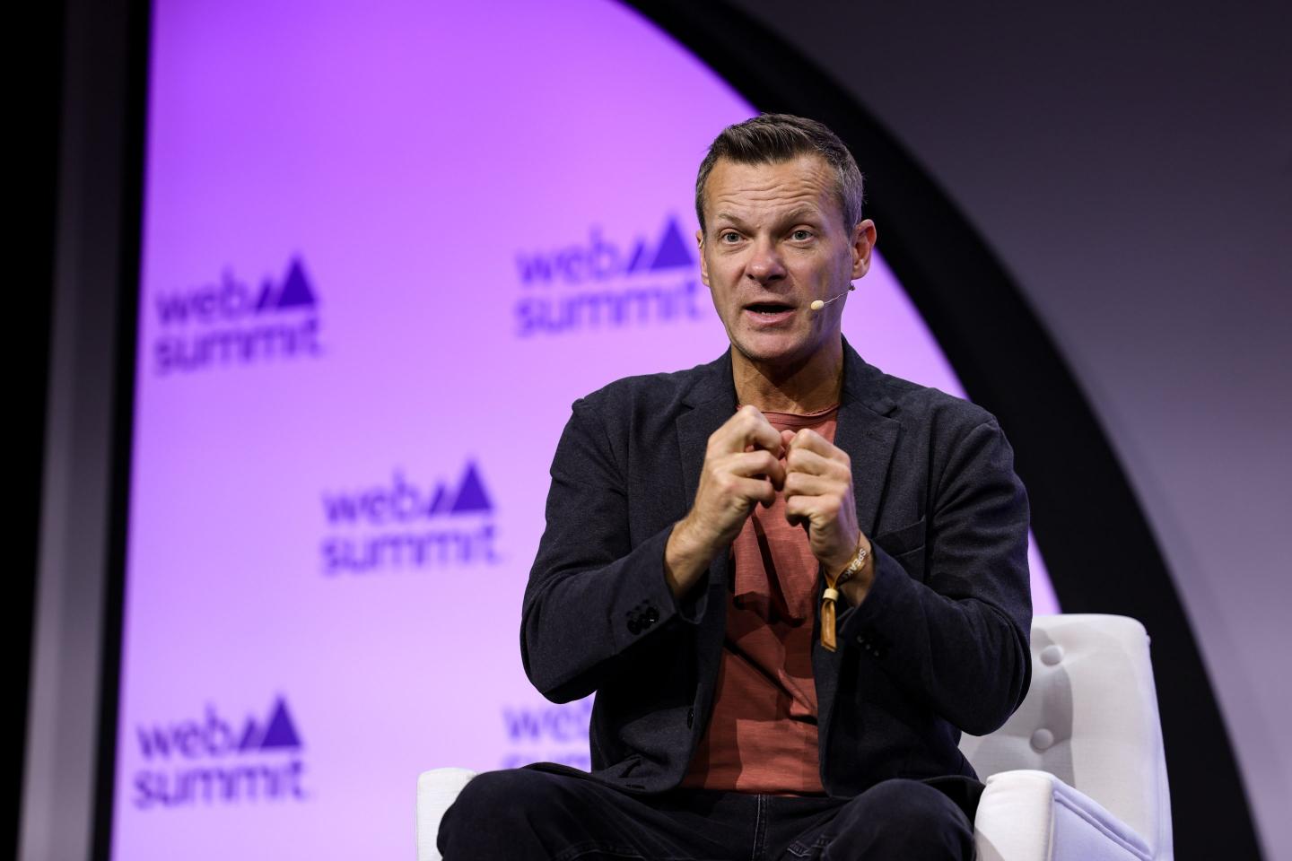 Dan Rogers speaking on stage.