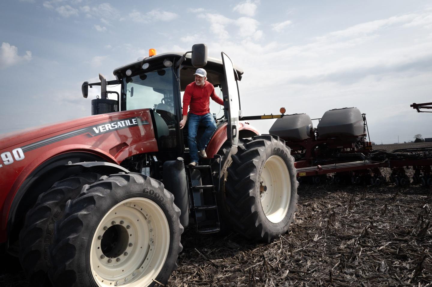 Dan Duffy uses a tractor to plant soybeans on land he farms with his brother on April 28, 2025 near Dwight, Illinois.