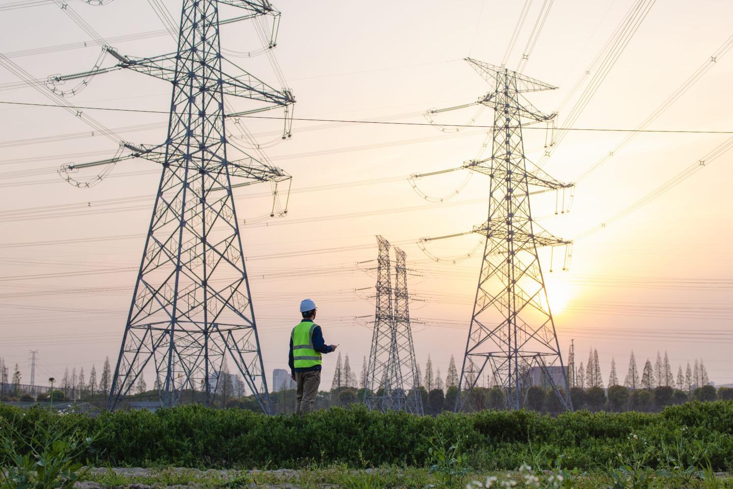 male engineer working under pylon