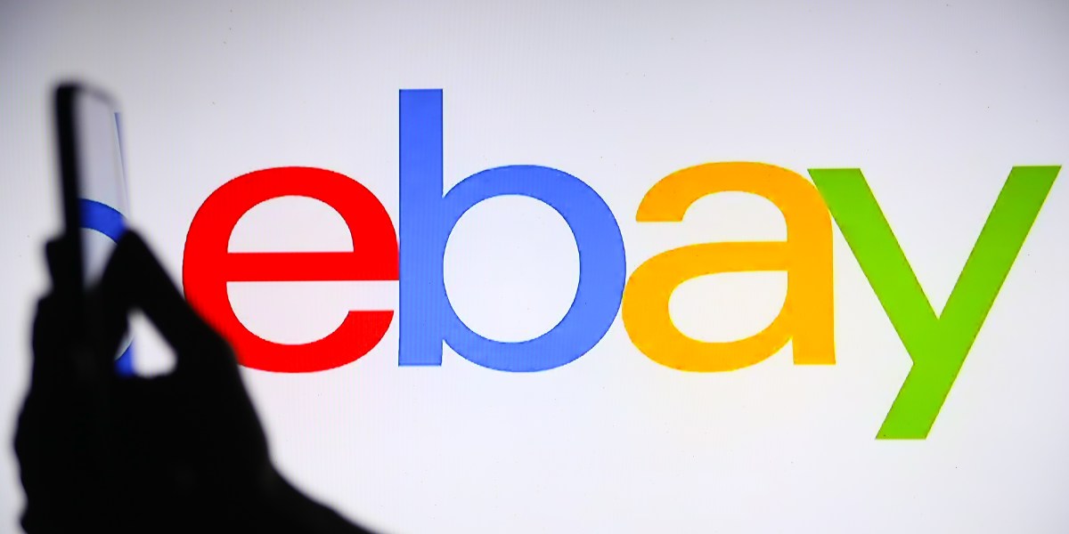 The eBay logo with a mobile phone in 2025. (Photo: Klaudia Radecka/NurPhoto/Getty Images)