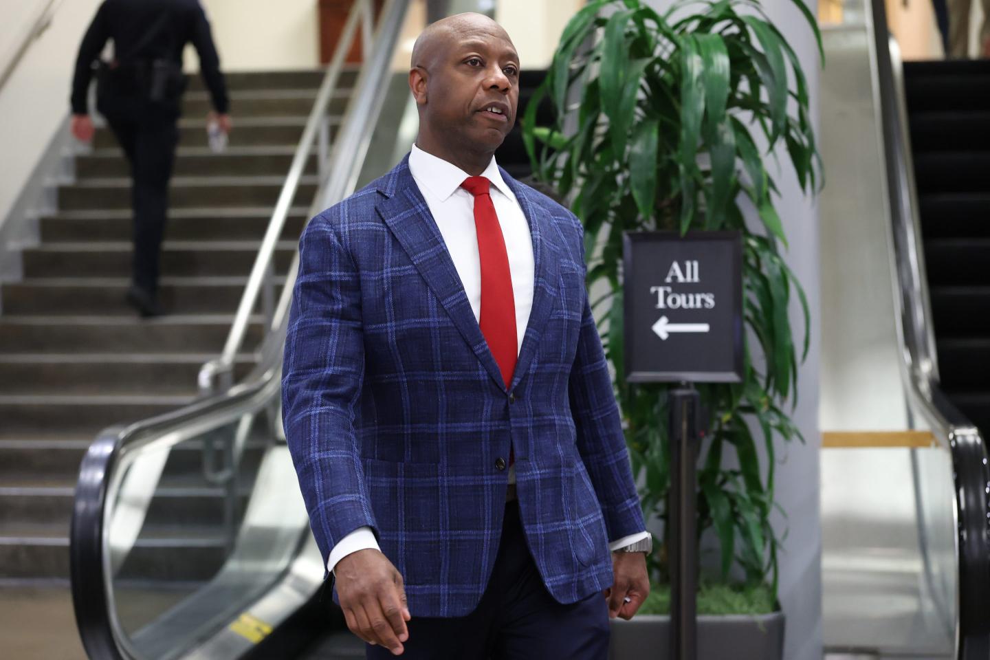 U.S. Senator Tim Scott walks in the senate subway of the U.S. Capitol