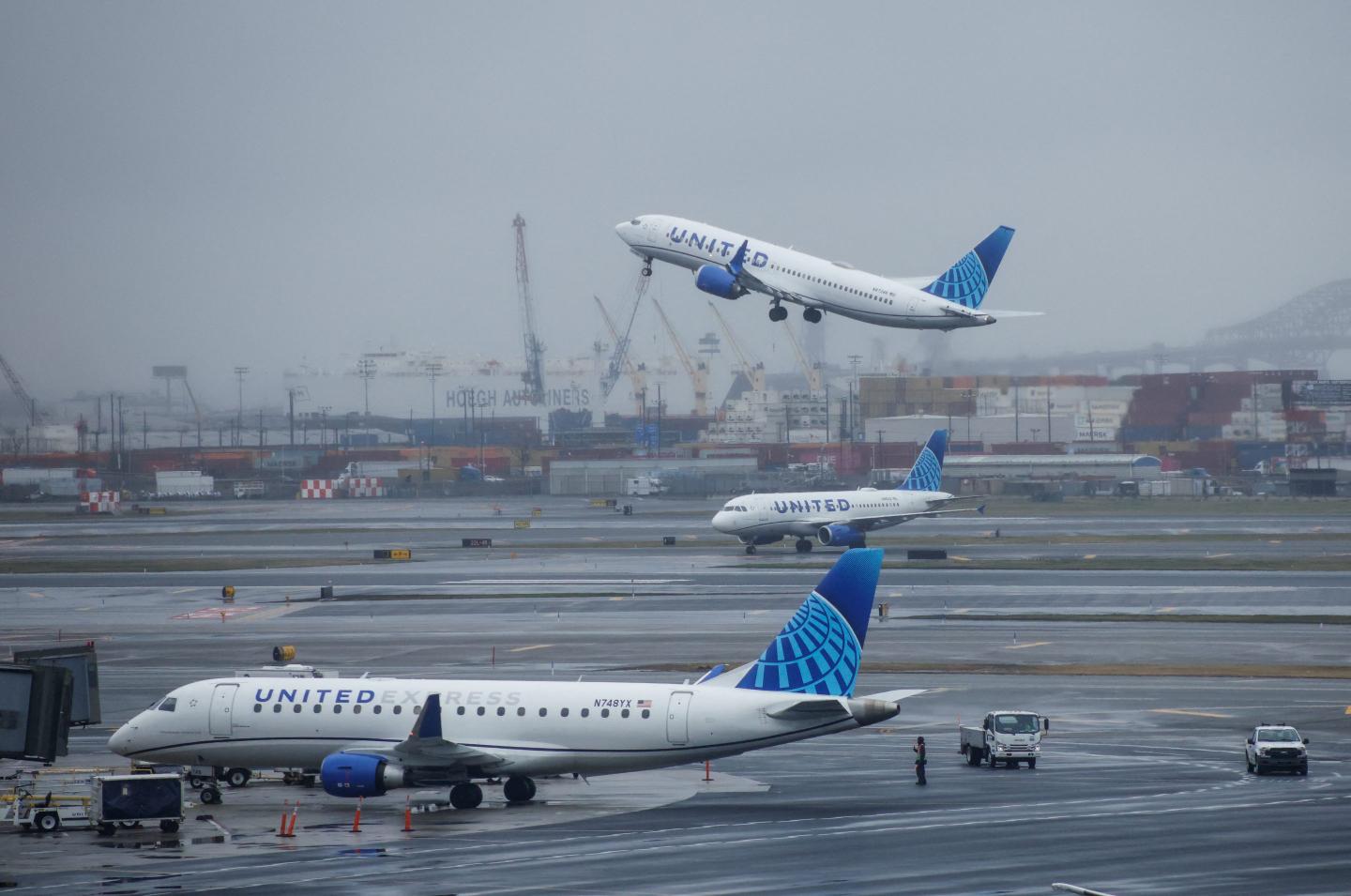 a united plane takes off