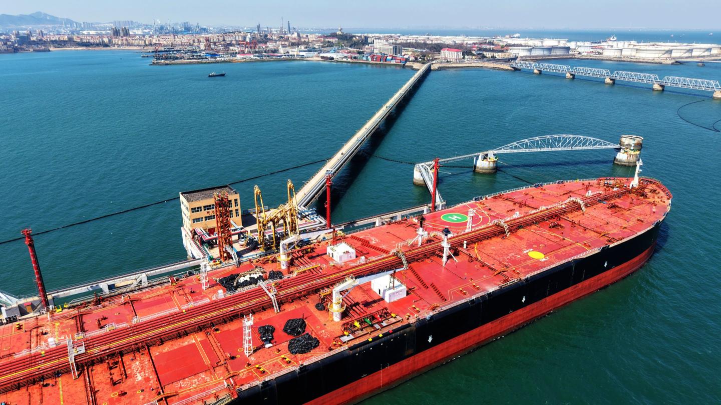An oil tanker unloads imported crude oil at the Qingdao Port Oil Terminal in Shandong Province, China, on April 4, 2026.