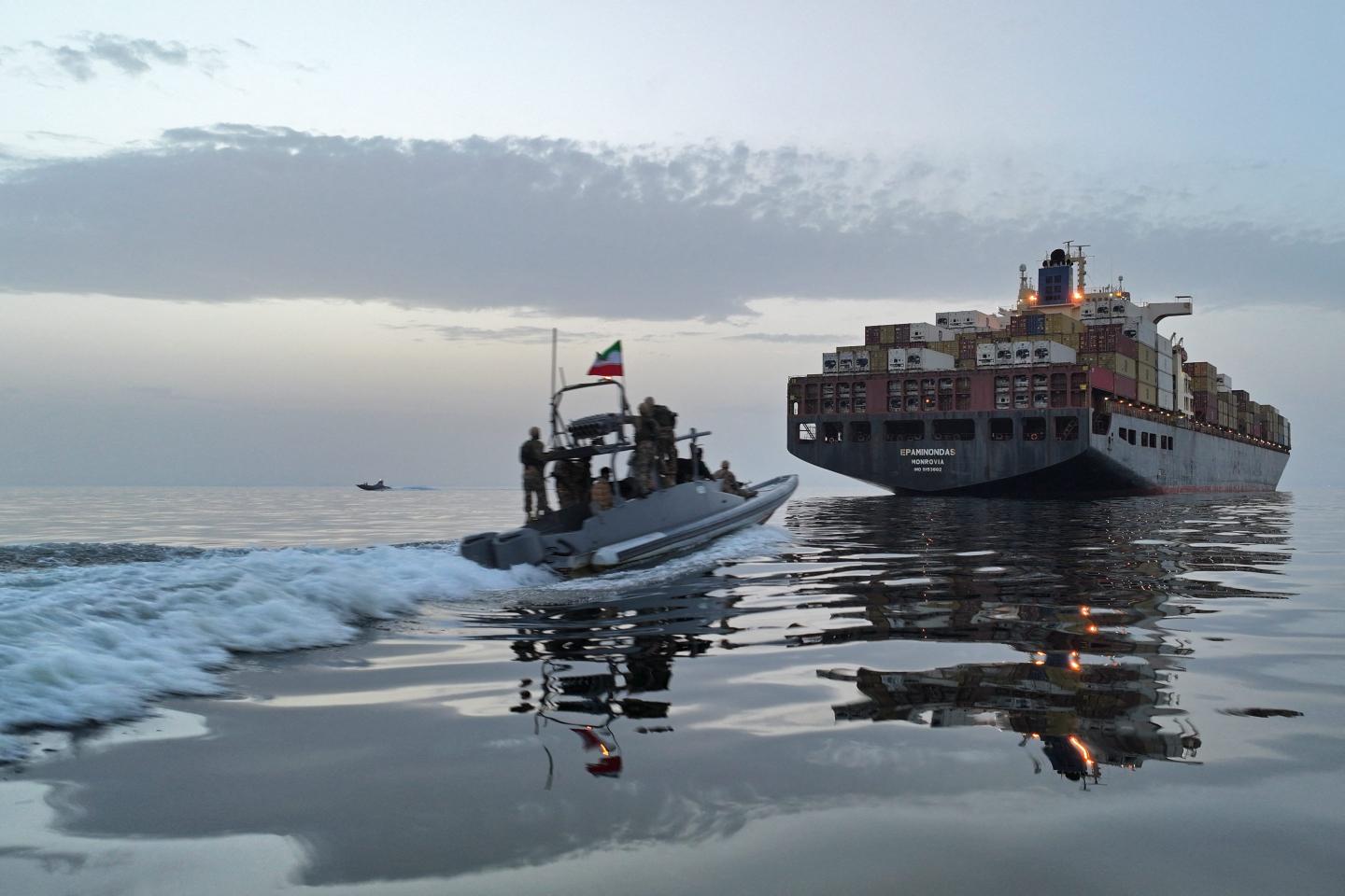 Cargo ship near the Strait of Hormuz comes under attack by multiple small boats as the U.S. and Iran exchange peace plans