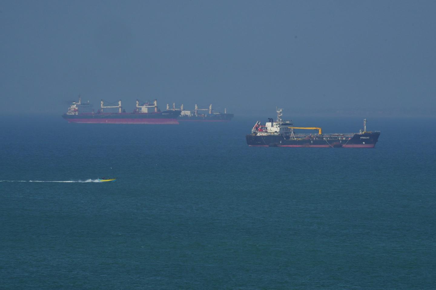 Shaky Iran war ceasefire tested again as drone hits cargo ship off Qatar coast while Kuwait and UAE repel drone attacks