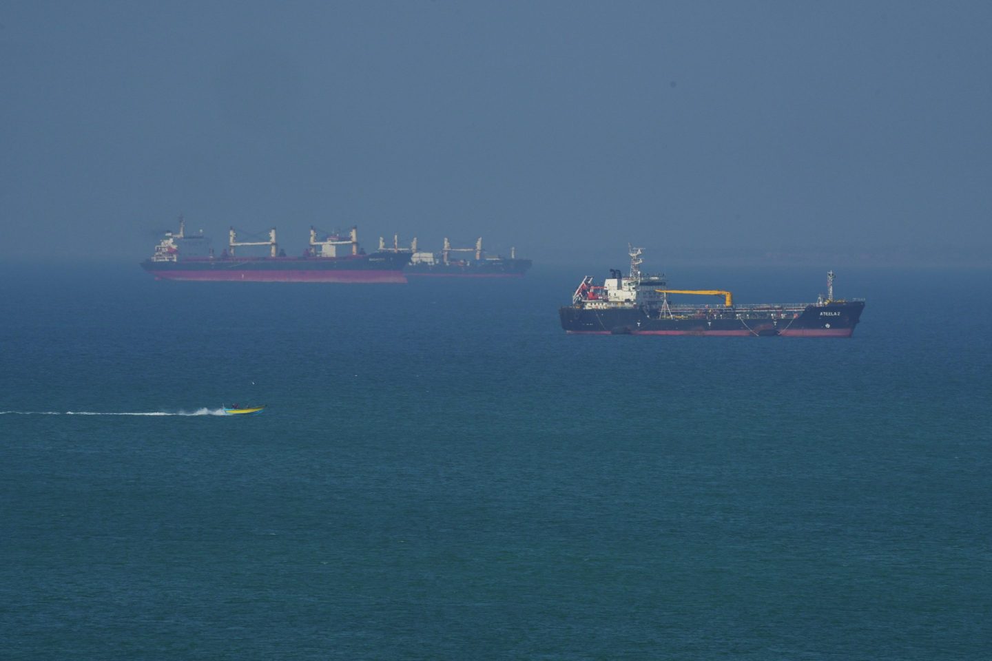 Shaky Iran war ceasefire tested again as drone hits cargo ship off Qatar coast while Kuwait and UAE repel drone attacks