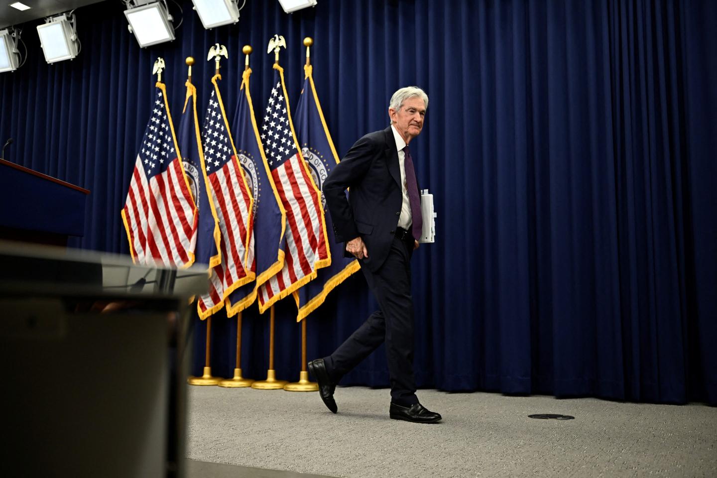 US Federal Reserve Chair Jerome Powell departs a press conference at the Federal Reserve Board Building in Washington, DC, on April 29, 2026.