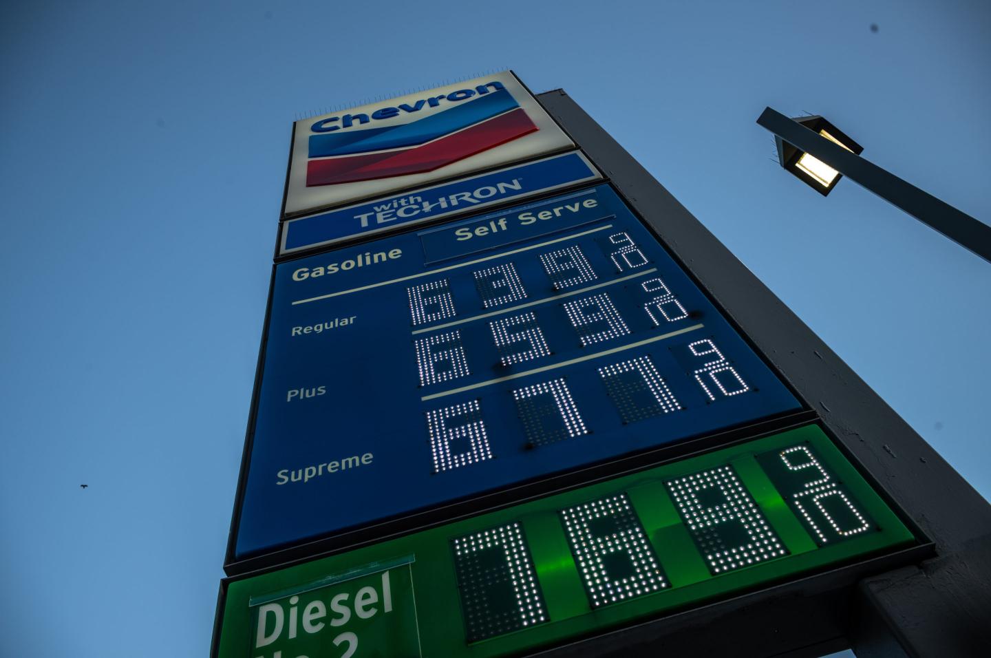 A sign displays the prices of unleaded gasoline and diesel fuel at a Chevron gas station in San Francisco, California, US, on Wednesday, May 13, 2026. The worst US inflation in years is once again eating away at Americans' paychecks, as rising gasoline and grocery prices threaten to undermine household spending.