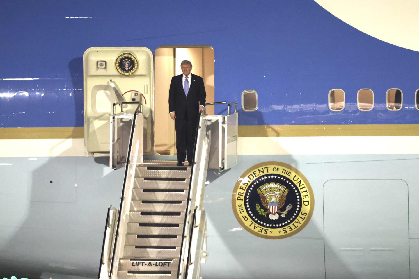 U.S. President Donald Trump departs Air Force One at Beijing Capital International Airport on May 13, 2026 in Beijing, China.