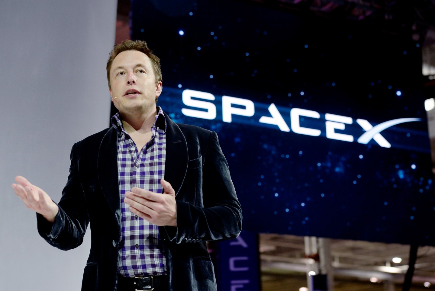 SpaceX CEO Elon Musk unveiling the company's new manned spacecraft in Hawthorne, Calif. on May 29, 2014. (Photo: Kevork Djansezian/Getty Images)