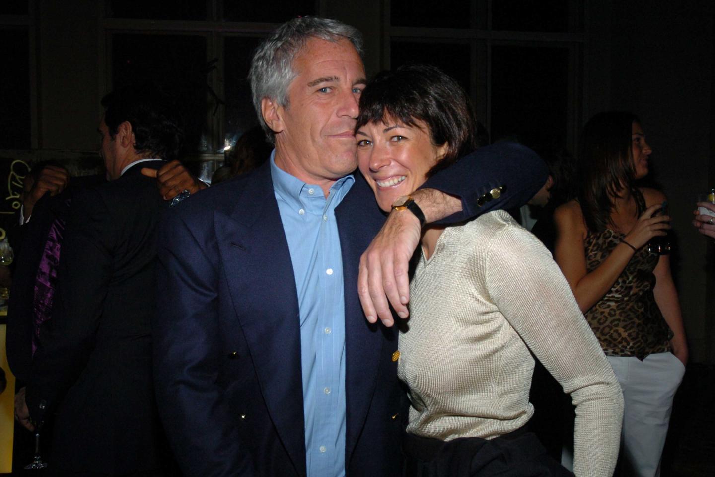Jeffrey Epstein puts his arm around Ghislaine Maxwell