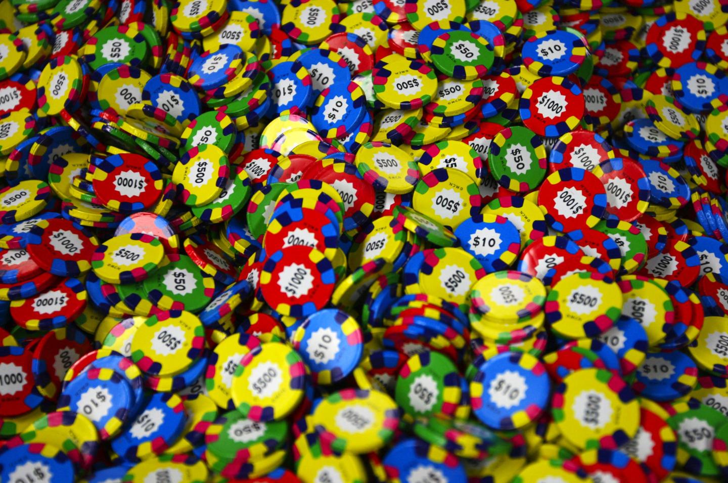 A huge pile of multicolored poker chips.