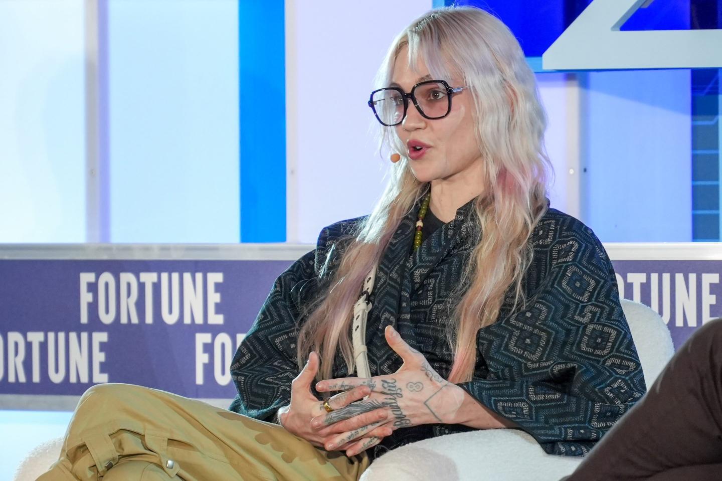 Singer-songwriter Grimes speaks on stage at Fortune Brainstorm Tech 2026 in Aspen, Colorado.