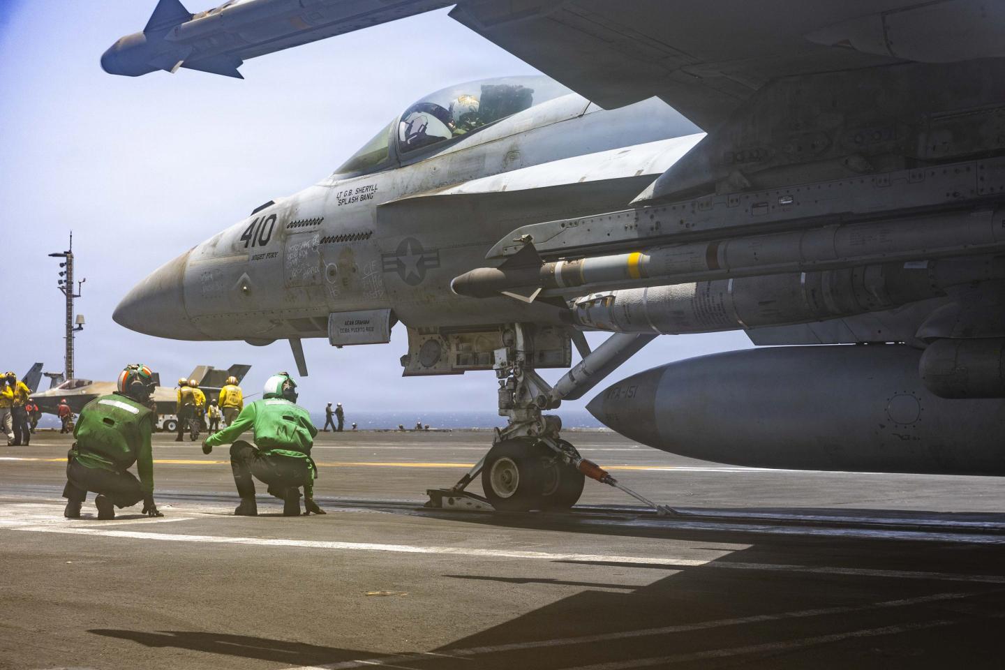 U.S. Sailors prepare an F/A-18E Super Hornet, attached to Strike Fighter Squadron (VFA) 151, to launch off the flight deck of Nimitz-class aircraft carrier USS Abraham Lincoln (CVN 72), May 31, 2026.