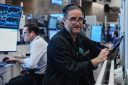 Options trader Chris Daytona, right, works on the floor of the New York Stock Exchange, Wednesday, June 3, 2026.