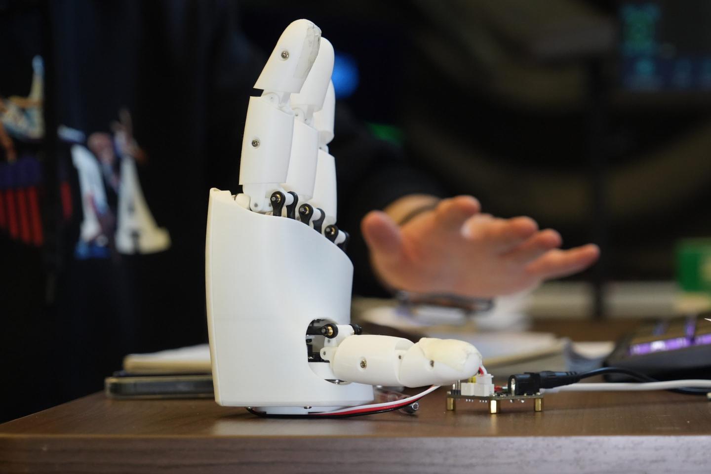 MIT researchers made a wristband to teach robots how to do housework and surgery