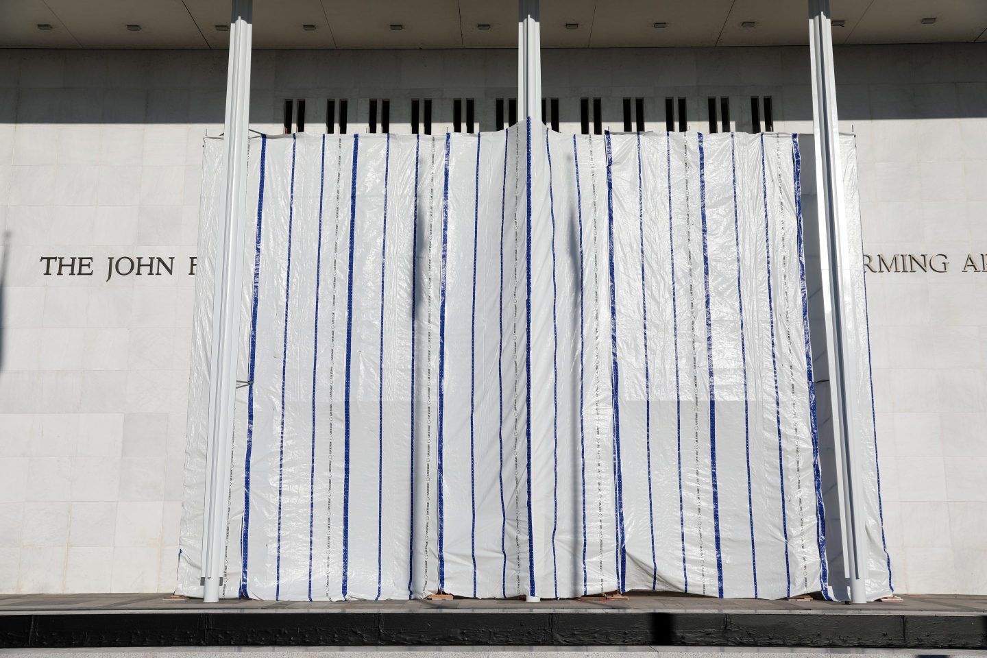 Workers start removing Trump’s name from the Kennedy Center, but there’s little on the venue’s schedule after a few upcoming events