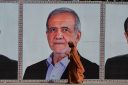 U.S. official says $6 billion in frozen Iranian assets will be released, while Oman discusses possible Hormuz service fees with Tehran