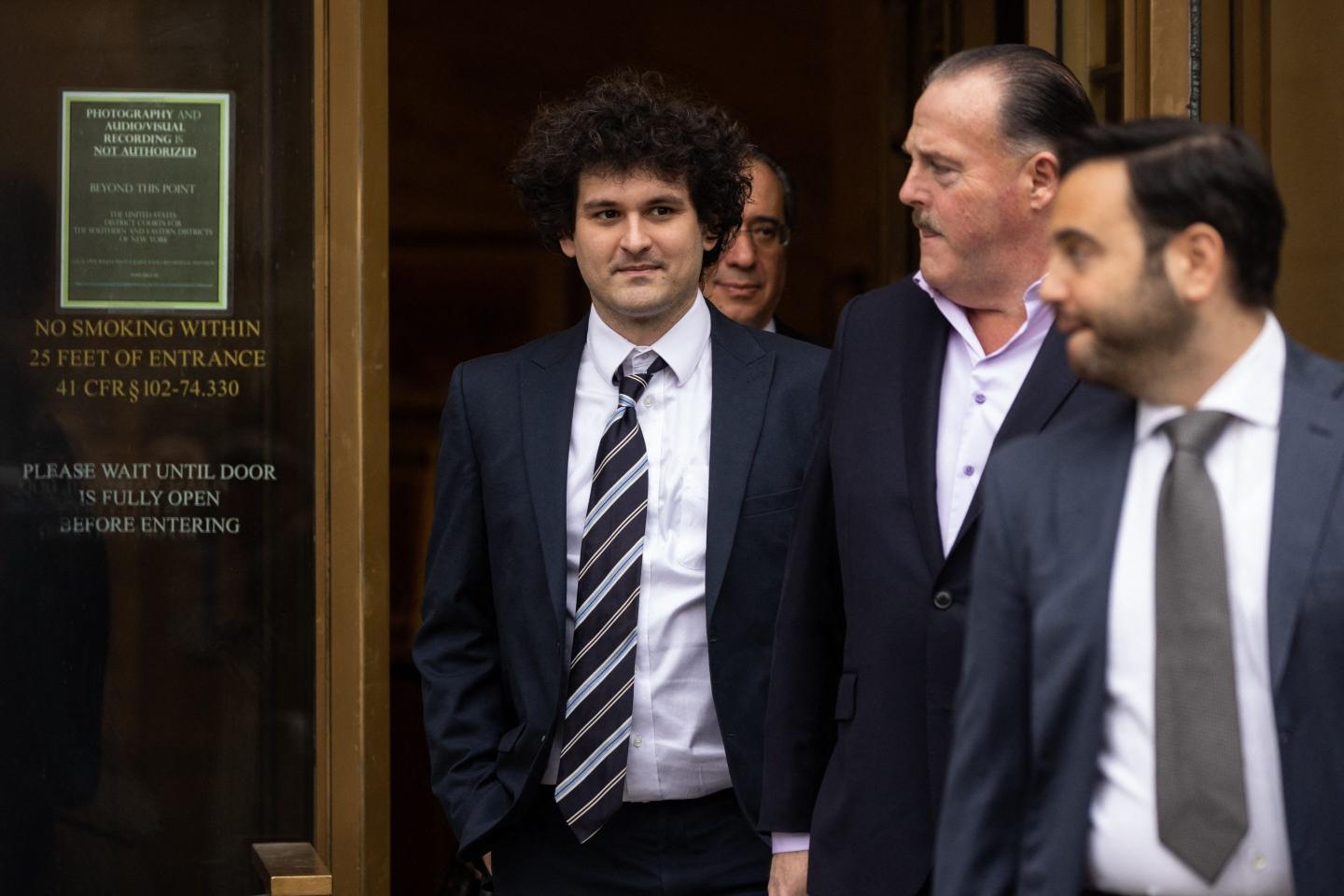 Samuel-Bankman-Fried leaving a Manhattan federal court amid his bail conditions hearing in 2023.