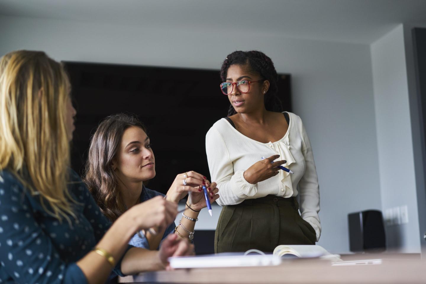 Young people working in an office.