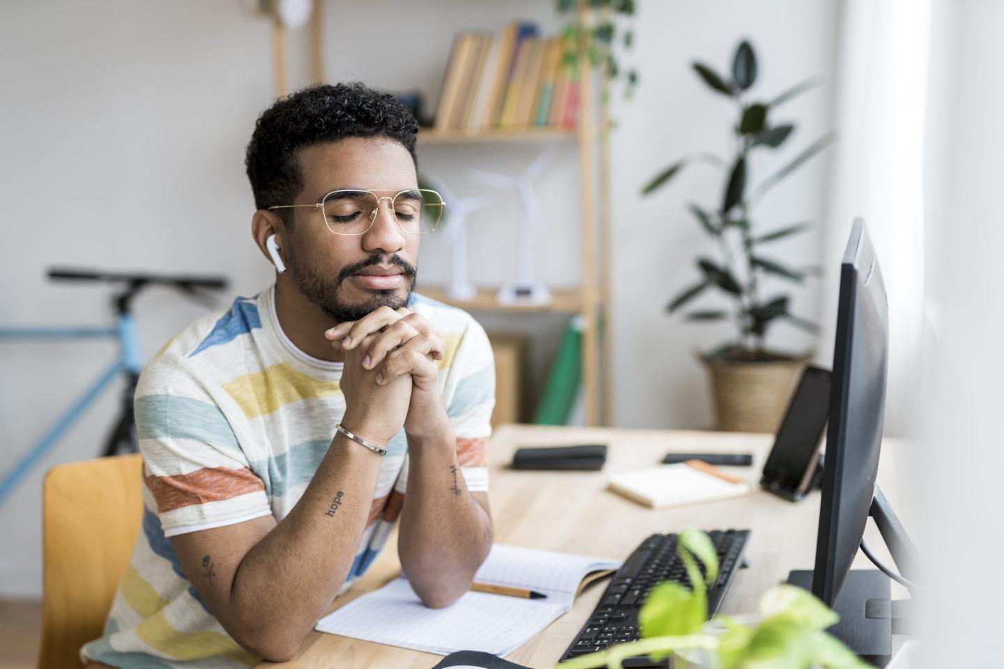 Young worker dreams while working