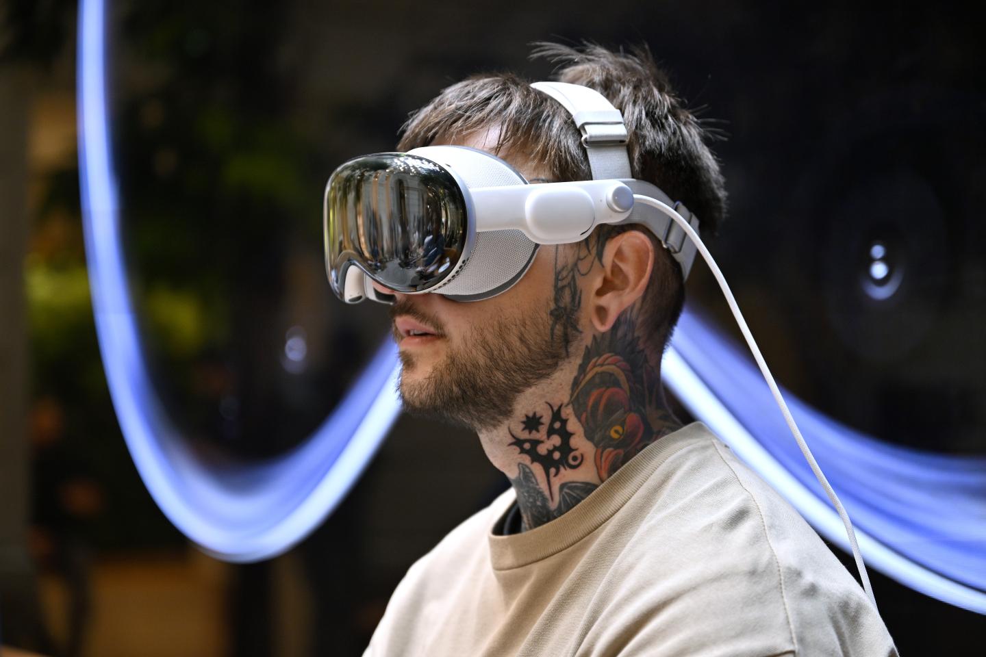 A customer wearing the Apple Vision Pro on July 12, 2024 in Paris, France. (Photo: Kristy Sparow/Getty Images/Apple)