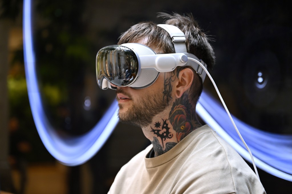 A customer wearing the Apple Vision Pro on July 12, 2024 in Paris, France. (Photo: Kristy Sparow/Getty Images/Apple)
