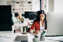 Young worker at desk