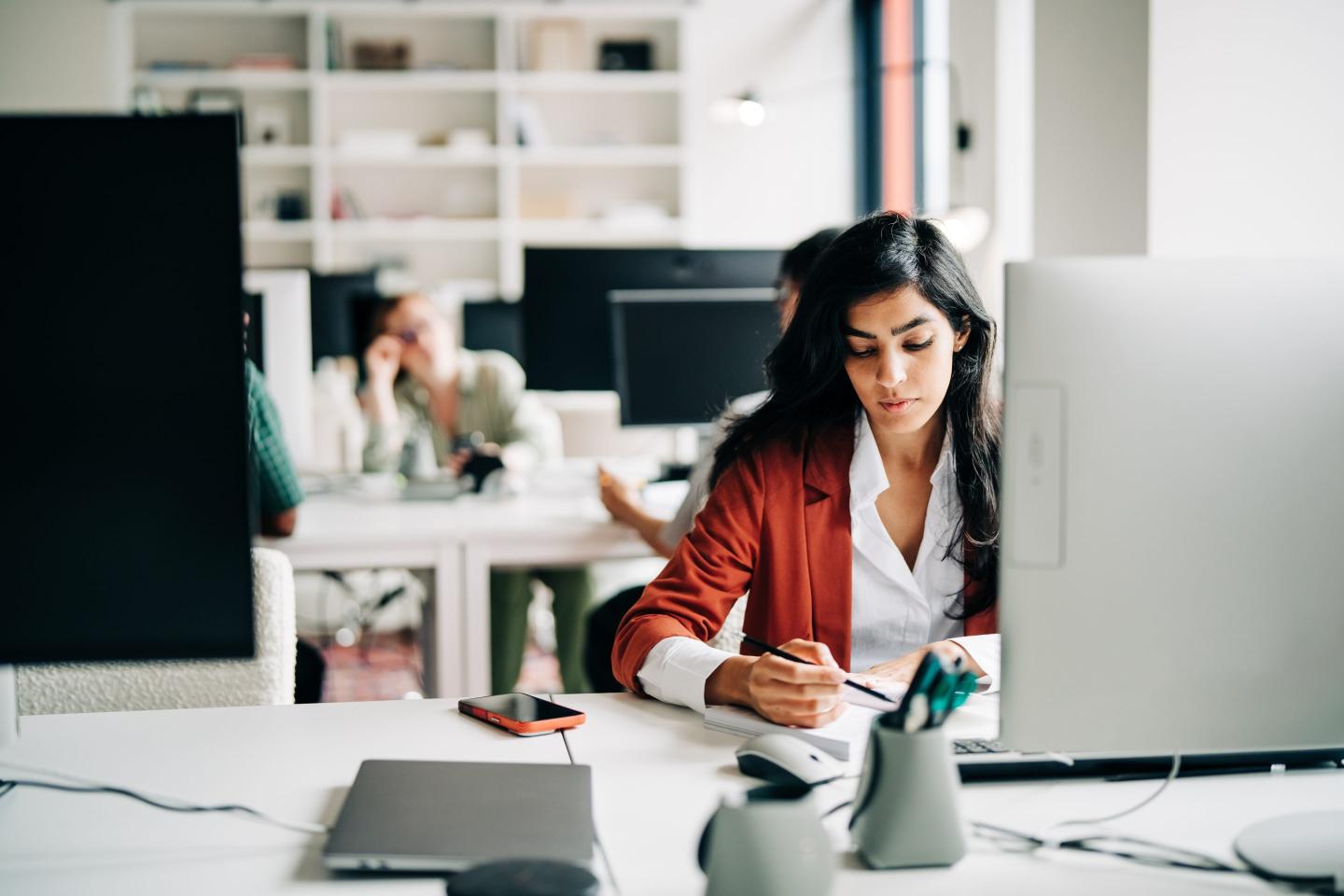 Young worker at desk